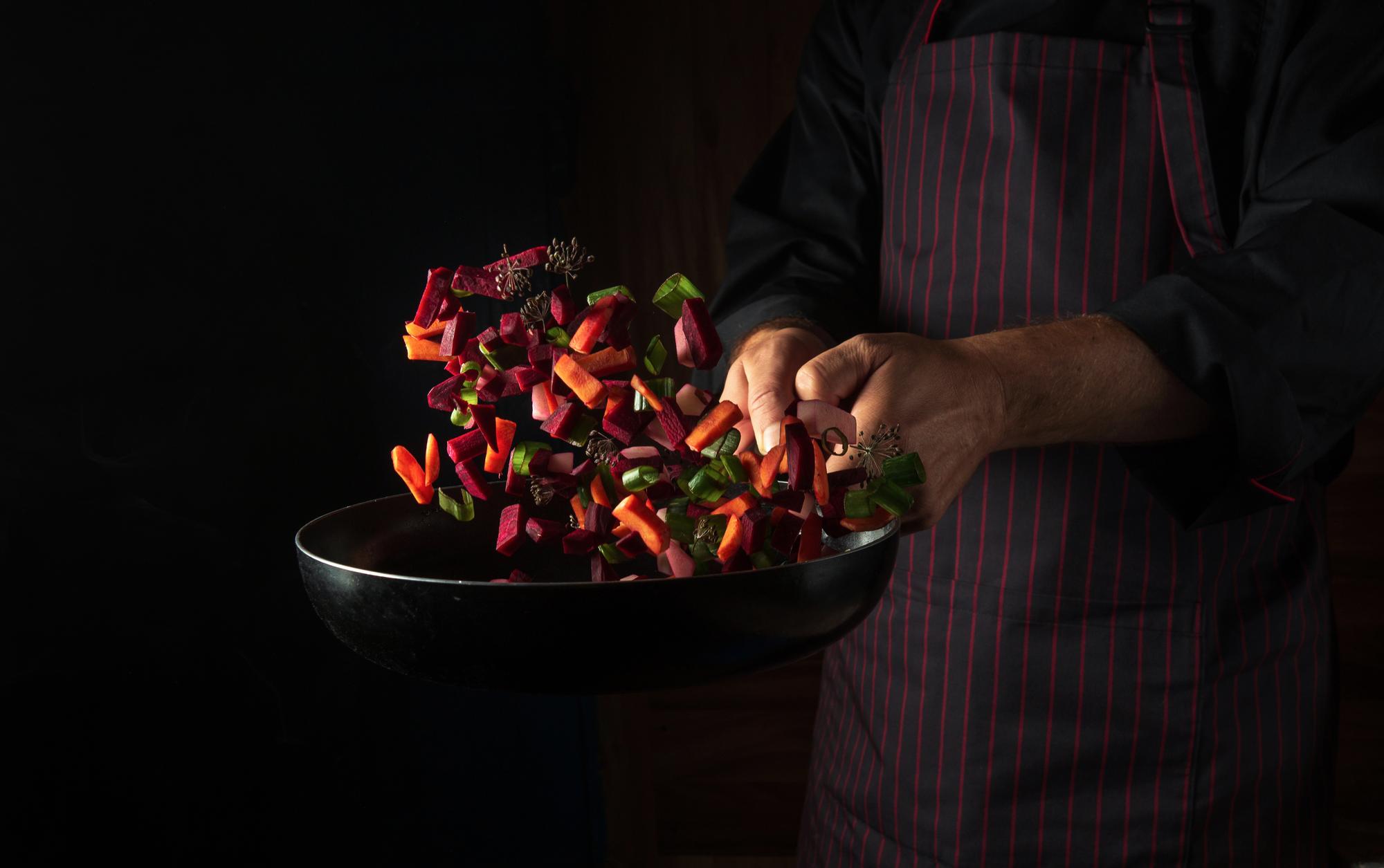 artisan chef preparing plate in studio kitchen