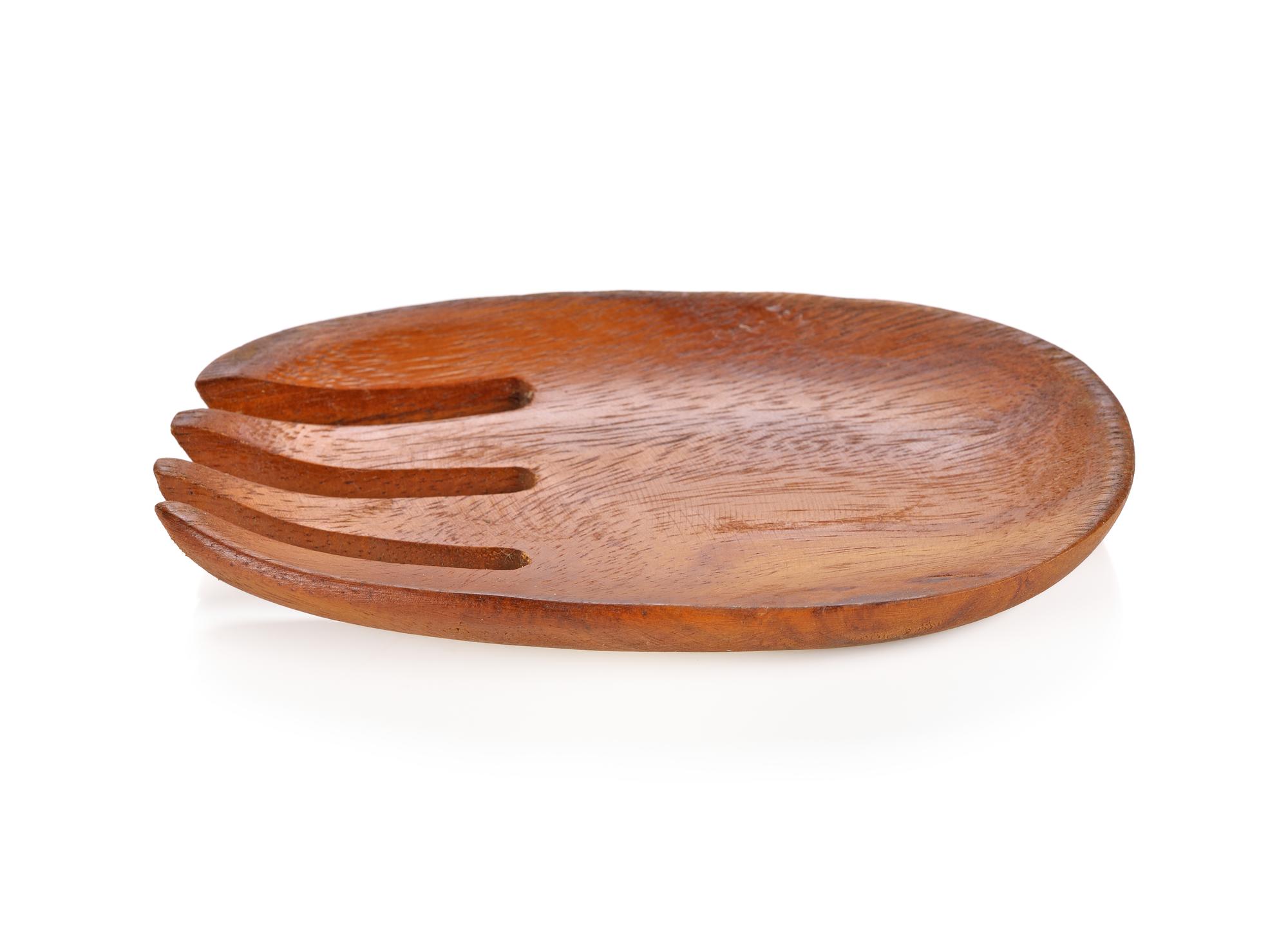 close-up crafted plated dish on wooden board
